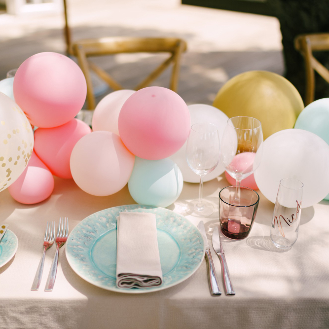 wedding dinner table reception blue plates with pattern napkin cream tablecloth little